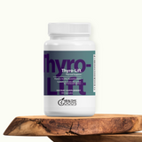 Thyro-Lift dietary supplement bottle on a wooden surface with a white background