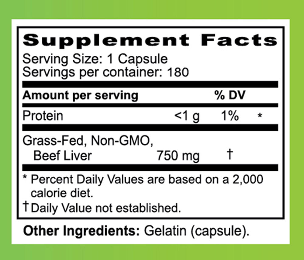 Supplement bottle labeled 'Grass-Fed Beef Liver' on a wooden surface with a white background