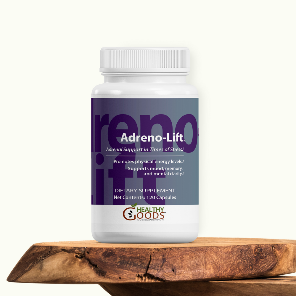 Supplement bottle labeled 'Adreno-Lift' on a wooden surface with a white background