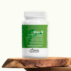 White supplement bottle labeled 'Bio-V' on a wooden surface with a white background